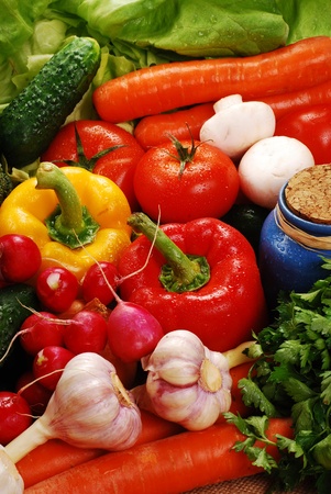 Composition with raw vegetables and dishの写真素材