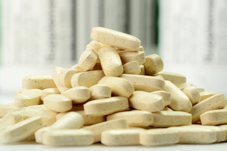 Composition with containers of dietary supplements and tabletsの写真素材