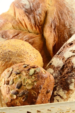 Composition with bread and rolls on kitchen tableの写真素材
