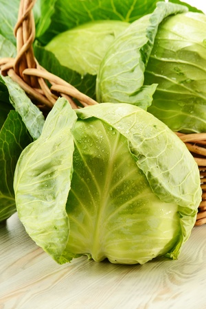 Cabbage and wicker basket の写真素材