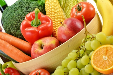 Composition with vegetables and fruits isolated on white