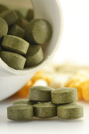 Composition with dietary supplement capsules and containers. Variety of drug pillsの写真素材
