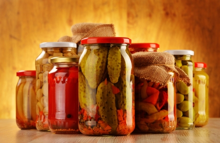 Composition with jars of pickled vegetables  Marinated foodの写真素材