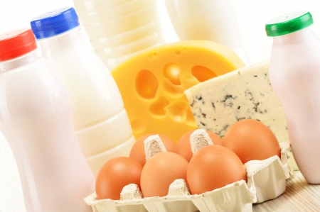 Composition with variety of dairy products isolated on whiteの写真素材