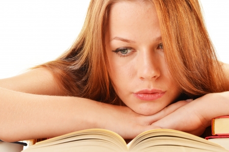 Young woman reading a book  Female student learningの写真素材