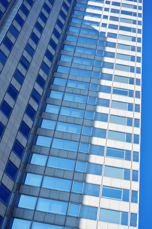 Modern commercial architecture over blue sky