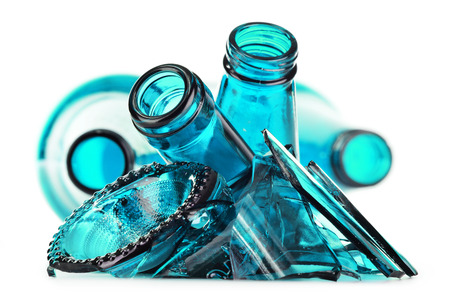 Pieces of broken glass over white background. Recycling.の写真素材