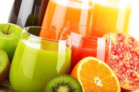 Composition with glasses of assorted fruit juices. Detox dietの写真素材