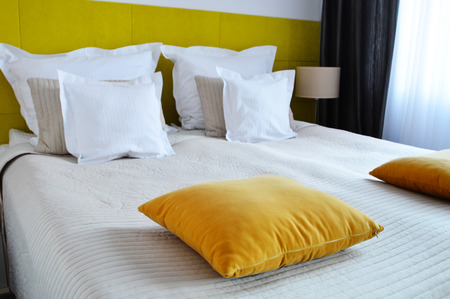 Double bed in hotel room. Accommodationの写真素材