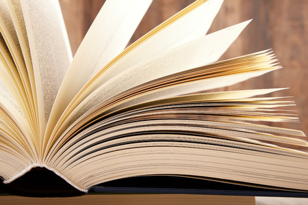 Composition with hardcover book in the libraryの写真素材