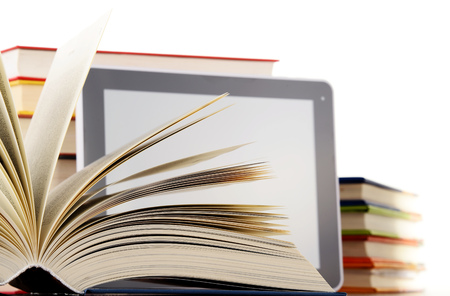 Composition with books and tablet computer isolated on white backgroundの写真素材