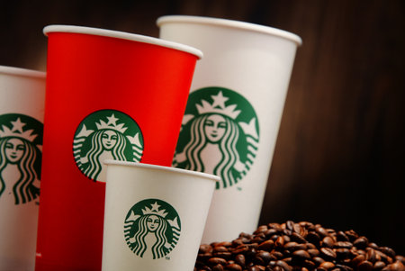 Starbucks coffee cups and beansのeditorial素材