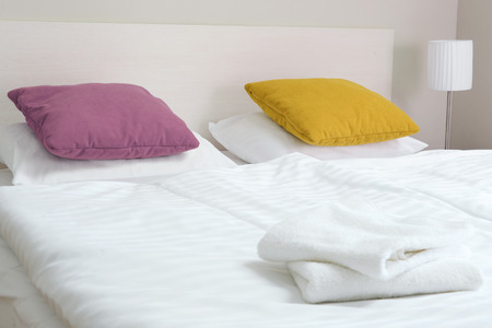 Double bed in hotel room. Accommodation.の写真素材