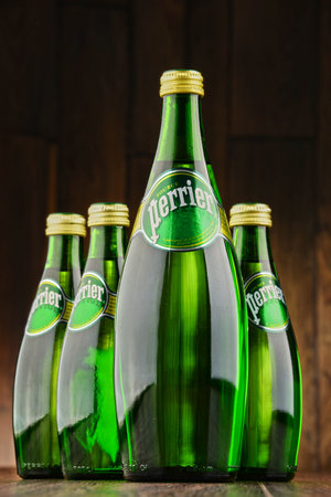 POZNAN, POLAND - JUNE 23, 2016: Perrier is a French brand of natural bottled mineral water sold...