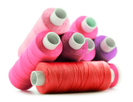 Composition with tailor threads isolated on white background