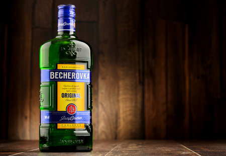 POZNAN, POLAND - JULY 27, 2016: Becherovka often used as a digestive aid is a an herbal bitters produced in Karlovy Vary, Czech Rep. by the Jan Becher company. Owned by Pernod Ricard.のeditorial素材