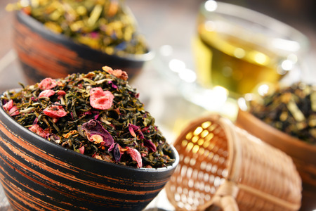 Composition with bowls of tea leaves.の写真素材