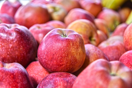 Fresh organic apples on street market stall.