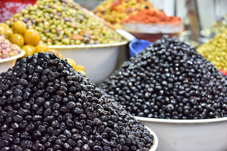 Assorted olives on the arab street market stall.の写真素材