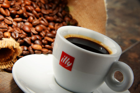 POZNAN, POLAND - APRIL 29, 2016: Illy is an Italian coffee roasting company that specializes in the production of espresso. Founded by Francesco Illy in 1933.のeditorial素材