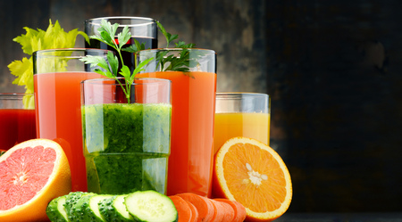 Glasses with fresh organic vegetable and fruit juices. Detox dietの写真素材