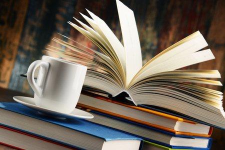 Composition with books and cup of coffee.の写真素材