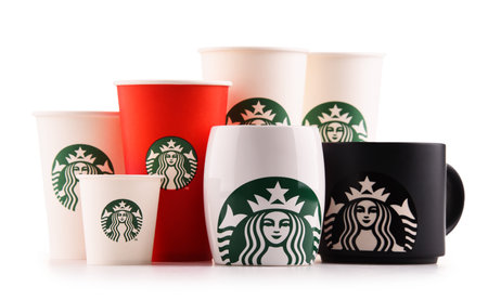 POZNAN, POLAND - JUL 20, 2017: Starbucks, coffee company and coffeehouse chain, founded in Seattle, Wa. USA, in 1971; now the largest business of this kind in the world operates 23,450 locationsのeditorial素材