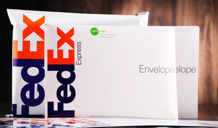 POZNAN, POL - AUG 2, 2017: Envelopes and parcels of FedEx, an American multinational courier delivery services company headquartered in Memphis, Tennessee.のeditorial素材
