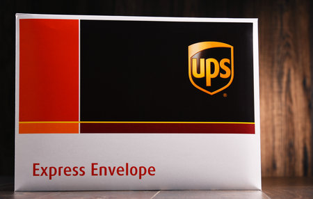 POZNAN, POL - AUG 2, 2017: Envelope of United Parcel Service or UPS, the world's largest package delivery company shipping over 15 million packages per day in more than 220 countriesのeditorial素材
