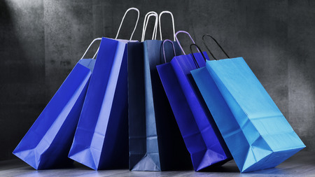 Composition with blue paper shopping bags.の写真素材