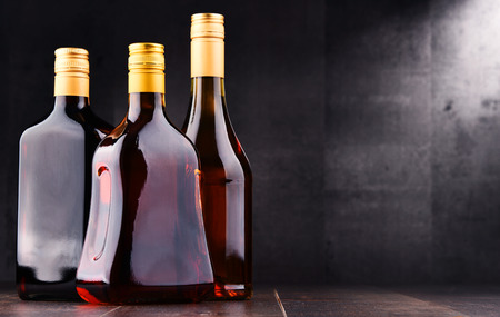 Composition with bottles of assorted alcoholic beverages.の写真素材