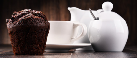 Composition with cup of coffee and muffin.の写真素材