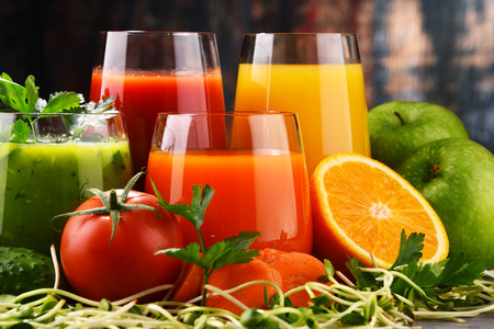 Glasses with fresh organic vegetable and fruit juices. Detox dietの写真素材