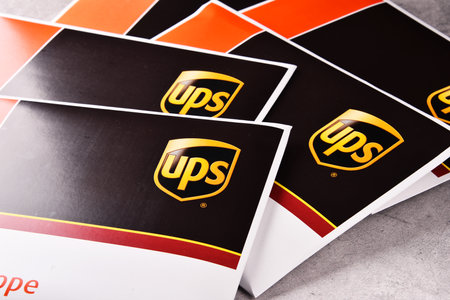 POZNAN, POL - OCT 4, 2017: Envelopes of United Parcel Service or UPS, the world's largest package delivery company, shipping over 15 million packages per day in more than 220 countriesのeditorial素材