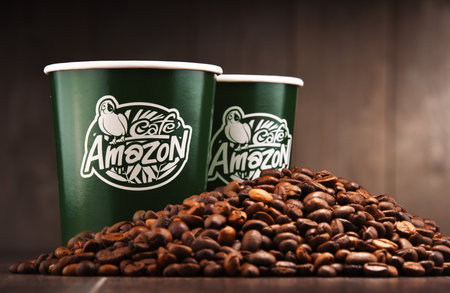 POZNAN, POLAND - FEB 8, 2018: Paper cup of Cafe Amazon, a chain of Thai cafes founded by PTT Public Company Limited, operating in over 2000 locations in Thailand and other east Asian countries.のeditorial素材