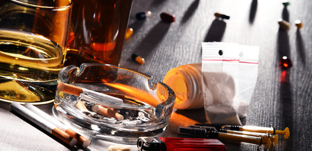 Addictive substances, including alcohol, cigarettes and drugs.の写真素材