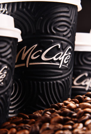 POZNAN, POLAND - MAR 7, 2018: McCafe cup of coffee, a brand of a coffee-house-style food and drink...