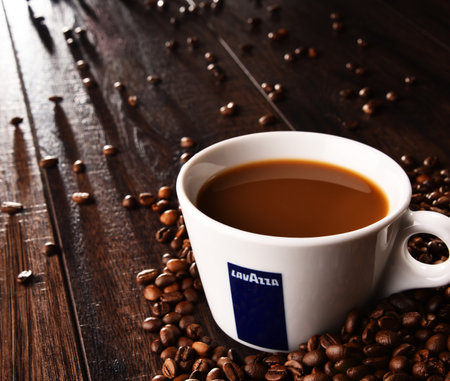 POZNAN, POLAND - MAR 7, 2018: Cup of Lavazza coffee, a brand owned by an Italian manufacturer of coffee products, founded in Turin in 1895 by Luigi Lavazza.のeditorial素材