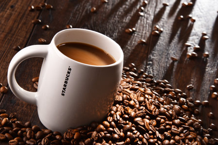 POZNAN, POLAND - MAR 7, 2018: Starbucks, coffee company and coffeehouse chain, founded in Seattle, Wa. USA, in 1971; now the largest business of this kind in the world operates over 27,000 locationsのeditorial素材