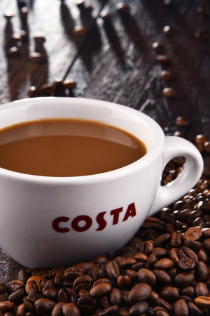 POZNAN, POLAND - MAR 7, 2018: Cup of Costa Coffee, a brand of British multinational coffeehouse company headquartered in Dunstable, Bedfordshire; second largest coffeehouse chain in the worldのeditorial素材