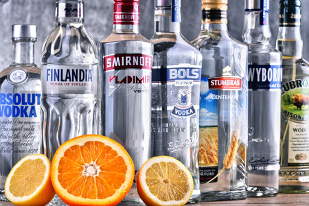 POZNAN, POLAND - MAR 30, 2018: Bottles of several global brands of vodka, the worlds largest internationally traded spirit with the estimated sale of about 500 million nine-liter cases a year.のeditorial素材