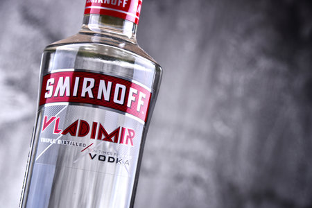 POZNAN, POLAND - MAR 30, 2018: Bottle of Smirnoff, a brand of vodka produced by the British company Diageo. Founded in Moscow by Pyotr Arsenievich Smirnov it is now distributed in 130 countriesのeditorial素材