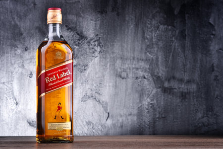 POZNAN, POL - MAR 30, 2018: Bottle of Johnnie Walker, the most widely distributed brand of blended Scotch whisky in the world with sales of over 130 million bottles a year.のeditorial素材