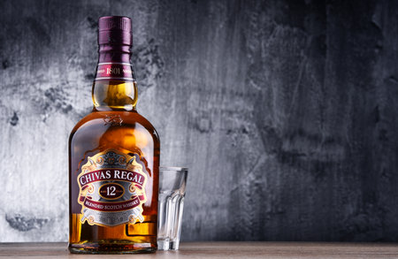 POZNAN, POLAND - MAR 30, 2018: Bottle of Chivas Regal 12, a blended Scotch whisky made from whiskies...