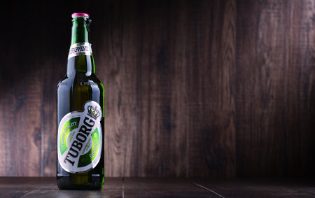 POZNAN, POL - JUN 8, 2018: Bottle of Tuborg beer, produced by a Danish brewing company founded in 1873 near Copenhagenのeditorial素材