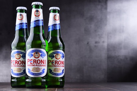 POZNAN, POL - MAY 4, 2018: Bottles of Peroni Nastro Azzurro, a premium lager produced since 1963 by Peroni Brewery located in Rome, Italy.のeditorial素材