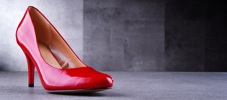Composition with a pair of red high heel shoes.の写真素材