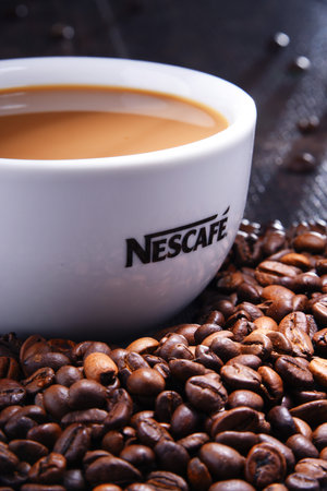 POZNAN, POLAND - AUG 3, 2018: Cup of Nescafe coffee, a brand of Swiss coffee made by Nestle, introduced in 1938のeditorial素材