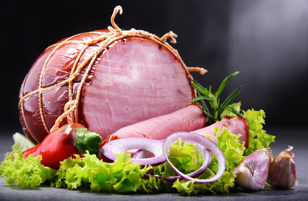 Composition with piece of ham. Meatworks products.の写真素材