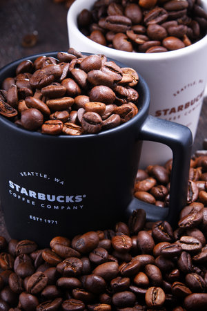 POZNAN, POL - NOV 29, 2018: Cups of Starbucks, coffee company and coffeehouse chain, founded in Seattle, Wa. USA, in 1971; now the largest business of this kind in the world operates 28,218 locationsのeditorial素材